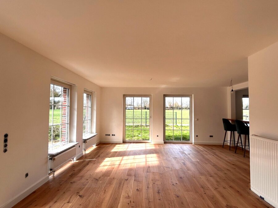 Modernes Wohnen in Toplage: Renovierte Wohnung mit Garten in Dangast - Wohnbereich (40862)