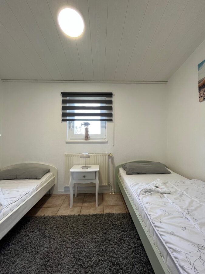 Ferienhaus-Ensemble in Traumlage – Ihr Paradies an der Nordsee 8,5%-Rendite - Schlafzimmer FeWo 1 (32515)