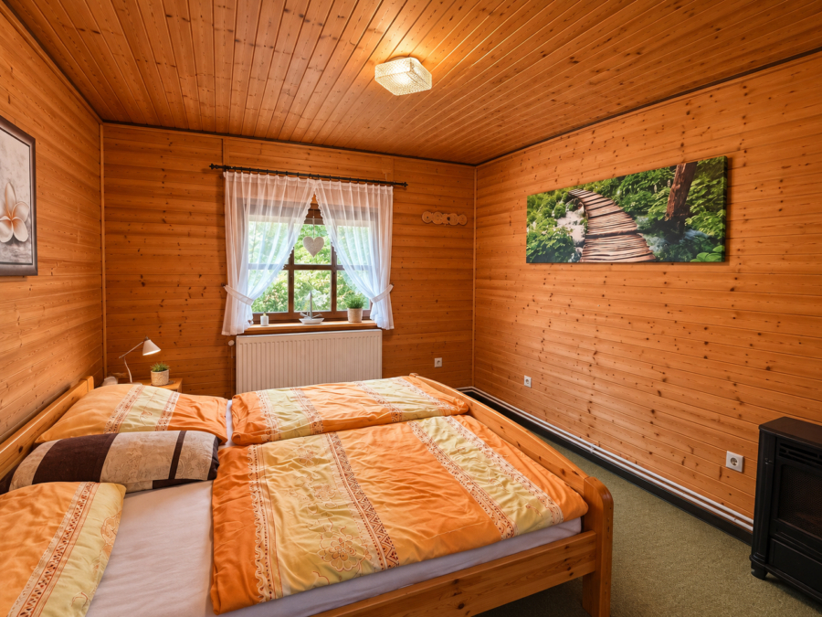 Ferienhaus am Bernsteinsee – Urlaubsglück nur wenige Schritte vom Wasser entfernt - Schlafzimmer (46753)