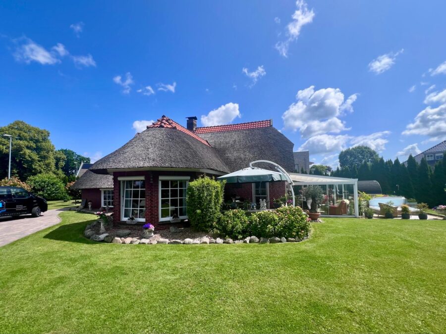 Friesische Gemütlichkeit unter Reet - Kauf mit Vermietungsgarantie - Rückansicht (32876)