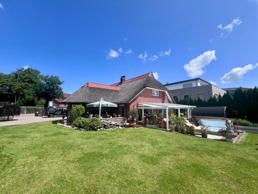 Friesische Gemütlichkeit unter Reet - Kauf mit Vermietungsgarantie - Rückansicht (32874)