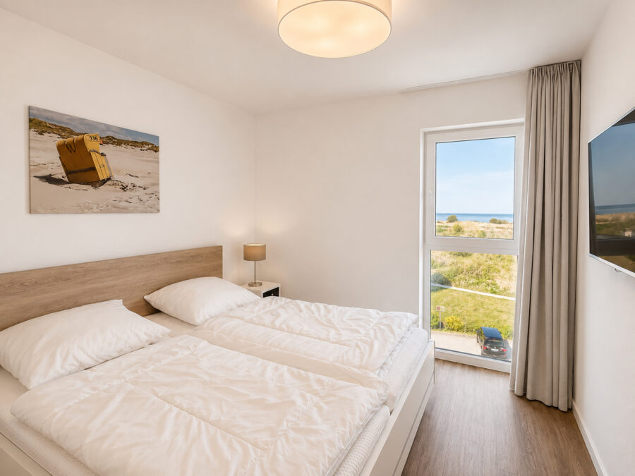 Traumwohnung mit Meerblick in Schillig an der Nordsee - 50.4.N - Schlafzimmer (43140)