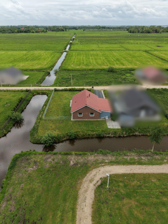 Exklusives Ferienhaus im Ferienpark Sehestedt - Drohnenaufnahme (41805)