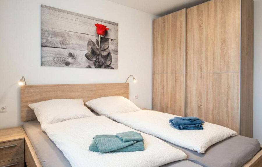 Exklusives Ferienhaus im Ferienpark Sehestedt - Schlafzimmer (41801)