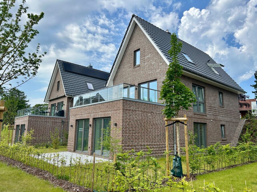 Investieren, Entspannen und Profitieren – Ihre Ferienimmobilie im Nordsee Park Dangast Haus-Nr.: 42 - Rückansicht (41548)