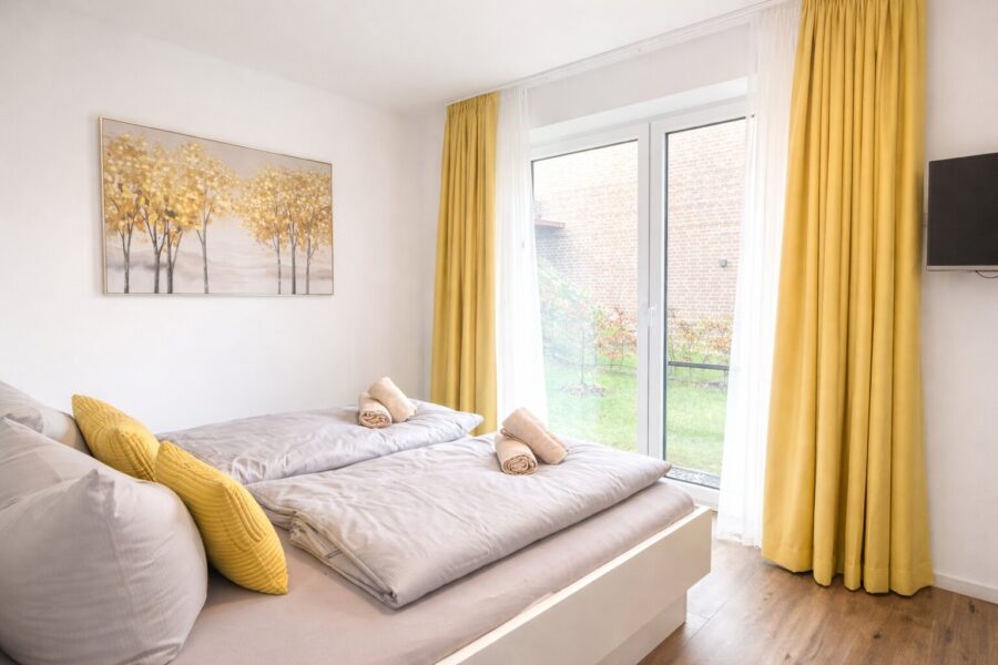 Investieren, Entspannen und Profitieren – Ihre Ferienimmobilie im Nordsee Park Dangast Haus-Nr.: 42 - Schlafzimmer (41560)