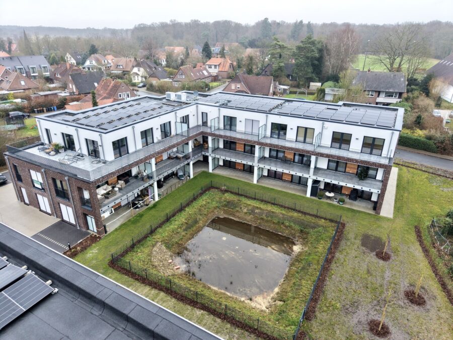 Wohnen am Urwald - 17 moderne Eigentumswohnungen in Neuenburg - Rückansicht (38601)