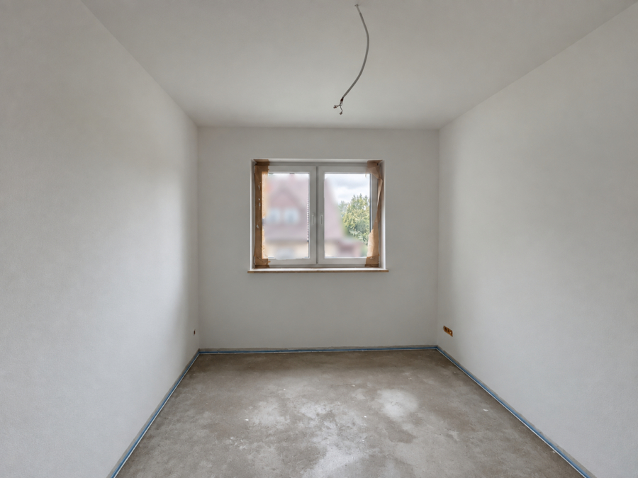 Neubau trifft Energieeffizienz: Moderne Doppelhaushälfte in Zetel - Schlafzimmer 1 (48876)